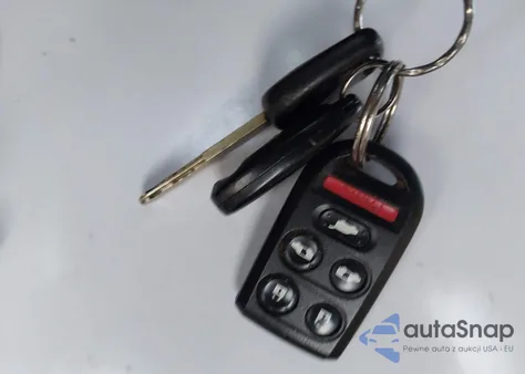 2010 Honda Odyssey Ex-L z USA, uszkodzony, nr VIN 5FNRL3H68AB091787